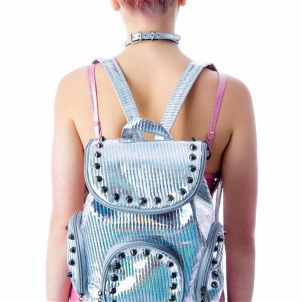 Looking for Everland Clothing holographic backpack